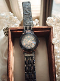 Montre homme vintage rétro à restaurer, bracelet noir, cadran motifs géométrique