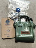 Mini pochette Cabaia verte effet verni neuf avec étiquette mini pouch