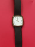 Montre vintage Yema Paris quartz cadran blanc dateur à réviser