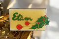 Pin's Etam vintage rétro Noël années 90, badge émaillé rectangulaire