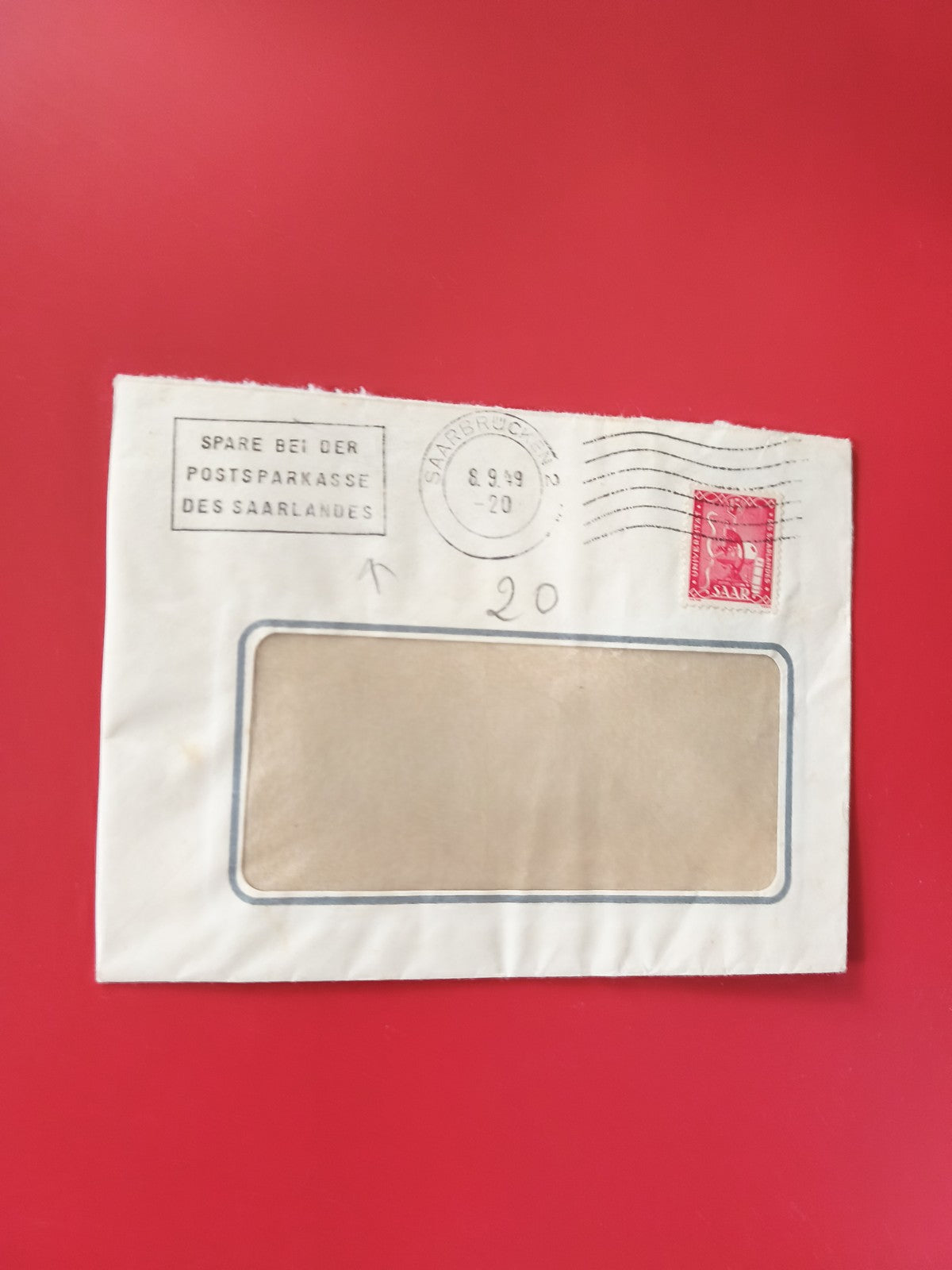 Enveloppe philatélie oblitérée Saarbrücken timbre rouge fenêtre transparente