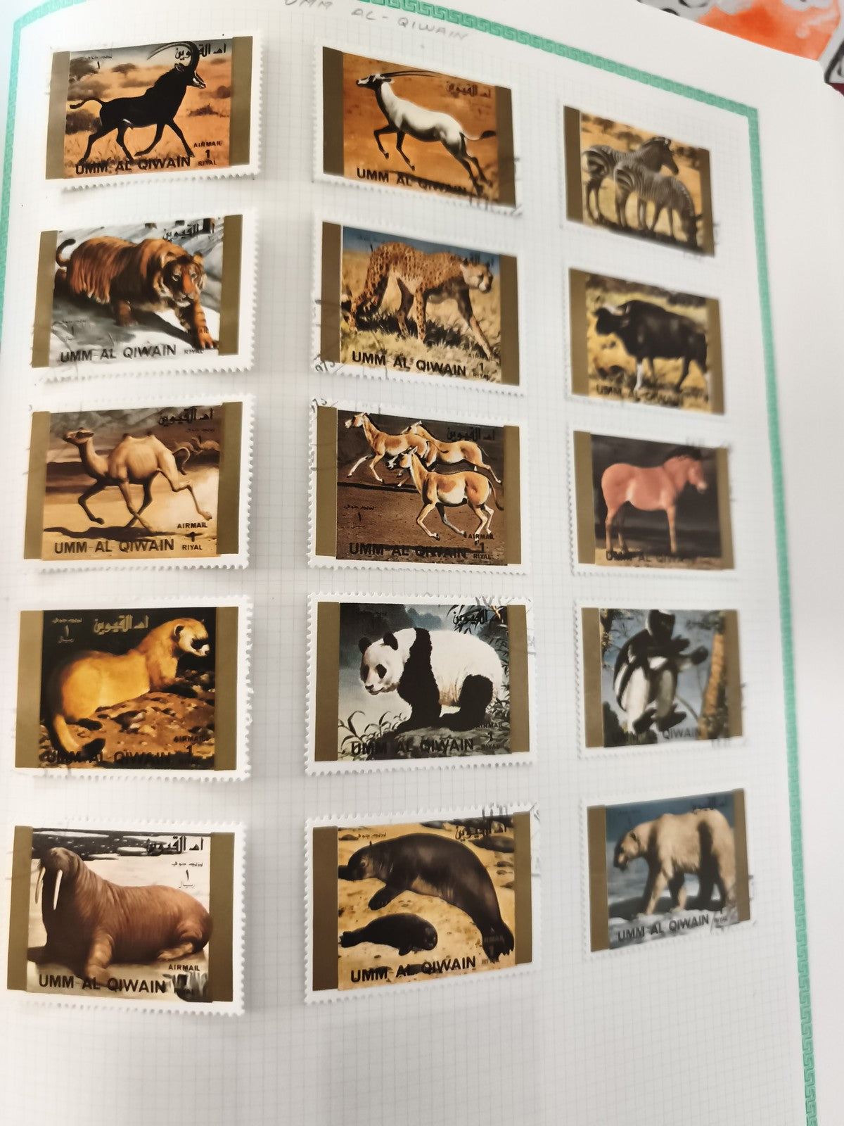 Timbres Umm Al Qiwain animaux sauvages série thématique philatélie