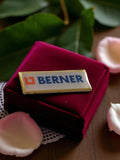 Pin's publicitaire Berner vintage années 80 logo rectangulaire rare