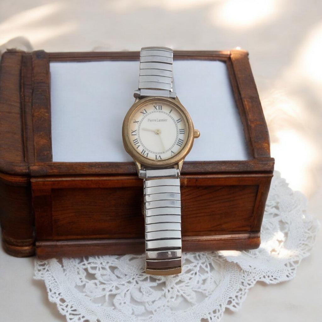 Montre vintage Pierre Lannier bracelet acier, cadran chiffres romains, classique