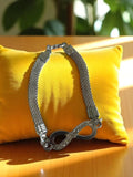 Bracelet vintage argenté motif infini strass, bijou fantaisie rétro élégant
