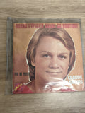Vinyle 45T Claude François Quand l?épicier ouvre sa boutique Feu de paille poche