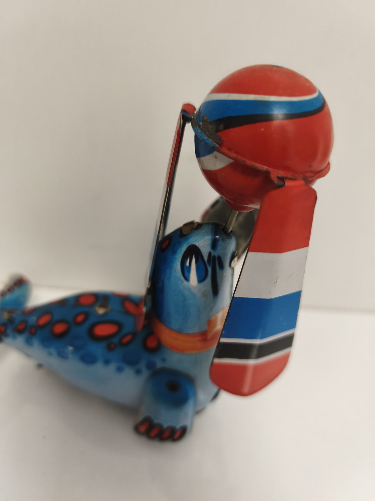 Jouet mécanique phoque cirque tôle peinte, tin toy seal, couleurs vives