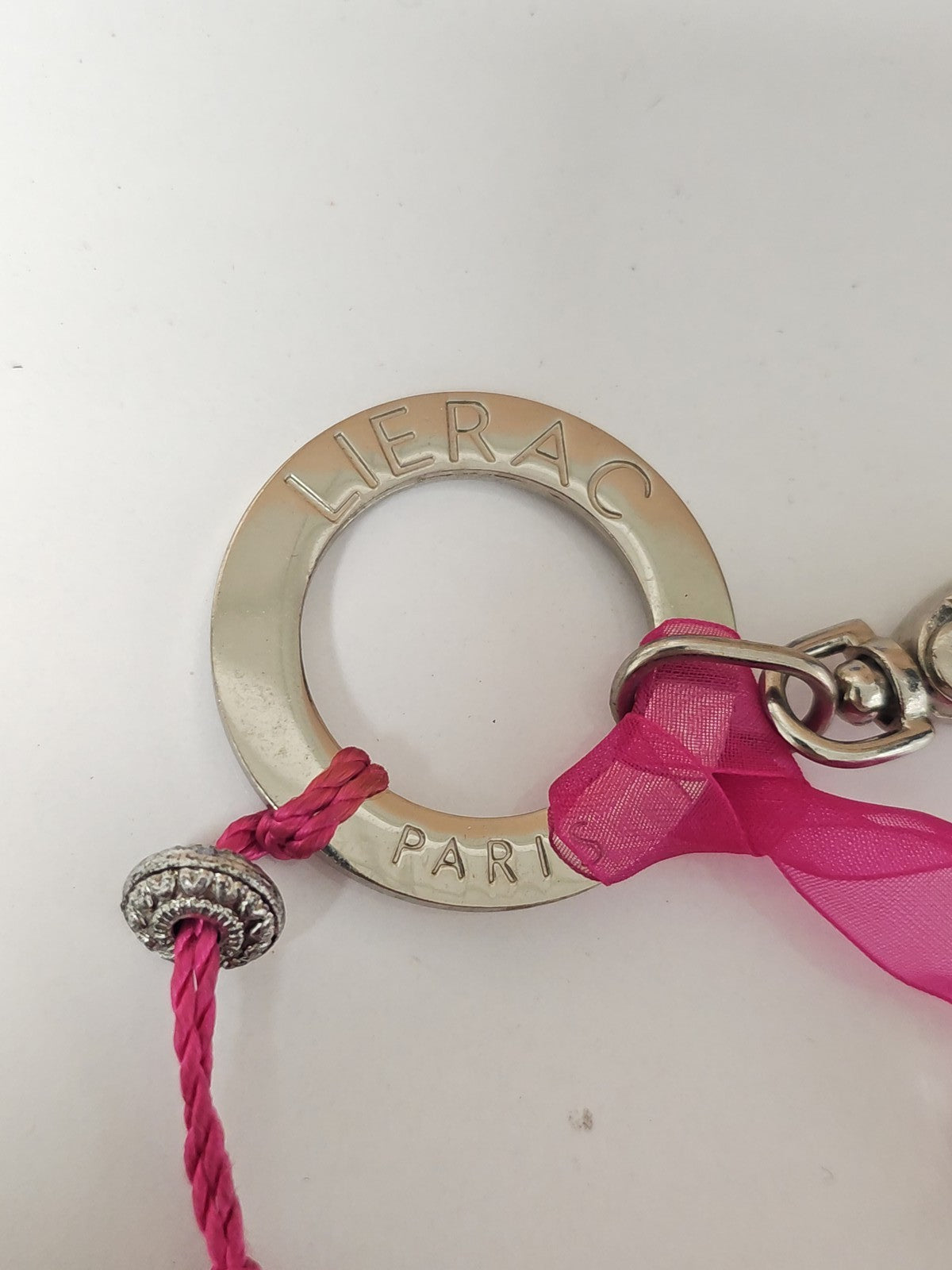 Vintage Lierac Paris keyring, retro advertising collectible from France