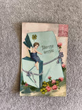 Carte postale illustrée Bonne année CPA ange trèfle fleurs timbre 10c France
