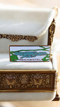 Pin's émaillé RECHASTEL vintage, illustration paysage, rare ancien badge