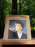 Vinyle 45 tours Mylène Farmer Sans contrefaçon vintage ancien disque rétro