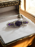 Broche vintage en métal argenté pierres violettes style Art nouveau rétro