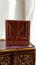 Pin's vintage Meistre émaillé rouge or, badge logo rare, broche ancienne