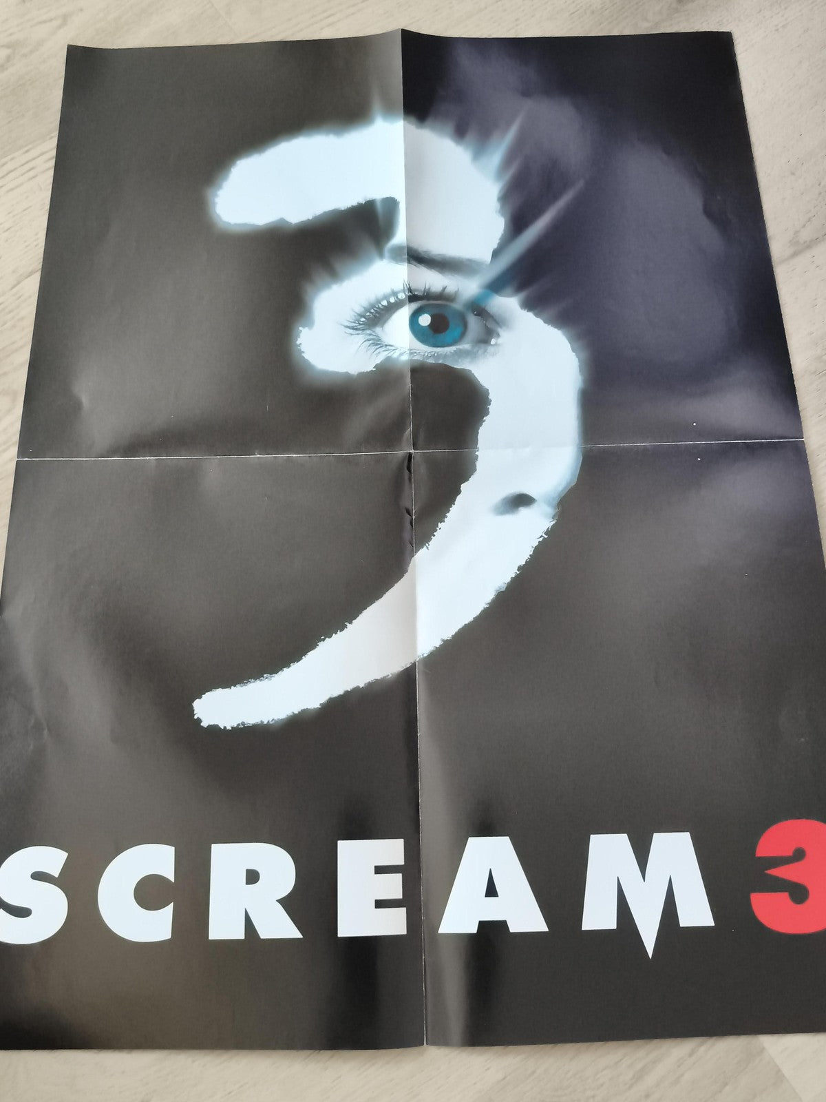 Poster film Scream 3 affiche cinéma pliée visuel œil logo noir