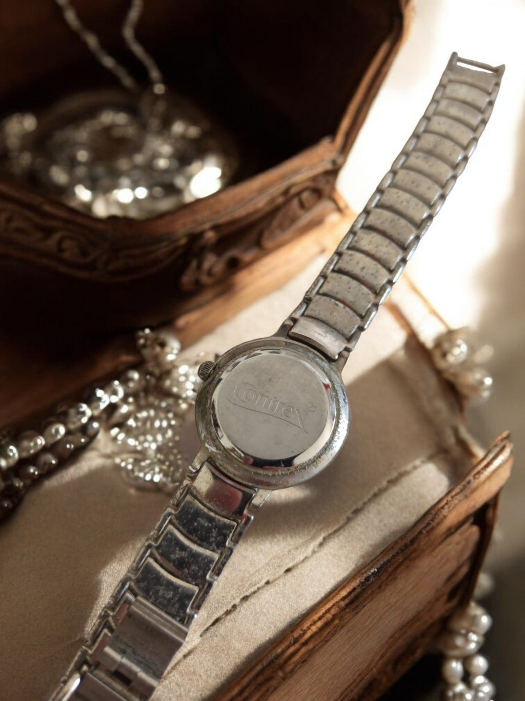 Montre femme vintage Contrex cadran bleu bracelet métal extensible rétro
