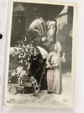 Carte postale ancienne Noël IRIS Père Noël traîneau jouets ange CPA vintage