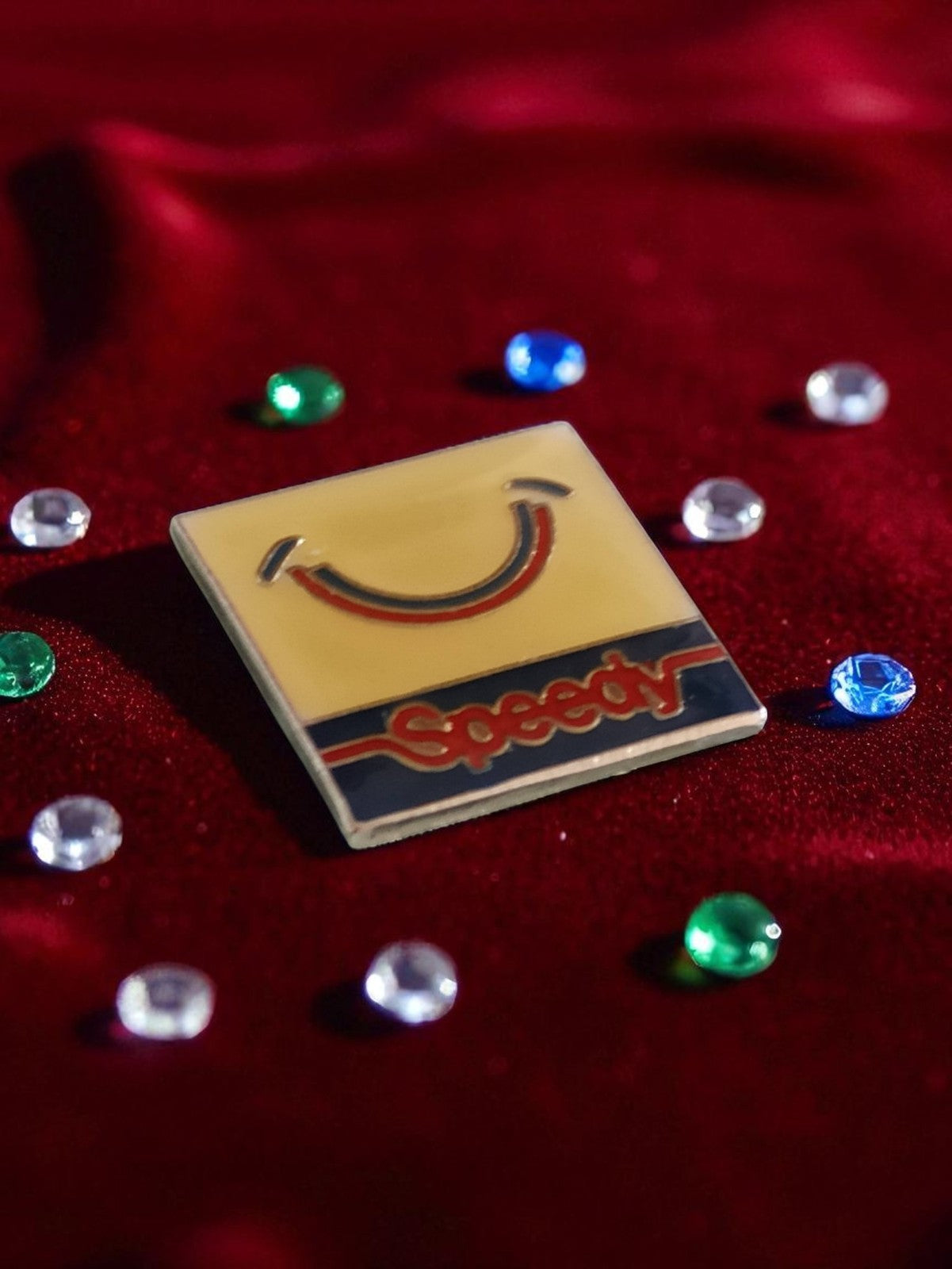 Pin's vintage émail Speedy carré logo sourire années 80 publicité rétro