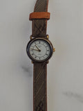 Montre femme vintage Elvia Paris cadran romain, bracelet motif, non testée