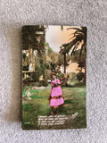 Carte postale illustrée CPA femme jardin palmier robe rose poésie