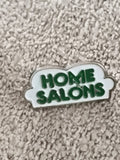 Pin's vintage HOME SALONS logo vert blanc, badge publicitaire ancien (Ref 10)