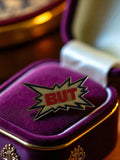 Pin's publicitaire vintage BUT édition limitée éclat étoilé pop art