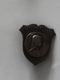 Médaille Villers-Châtel blason relief visage religieux insigne métal