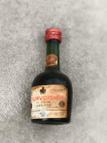 Miniature cognac Courvoisier Trois Étoiles Luxe bouteille verte partiellement re