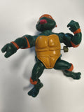 Figurine Tortue Ninja rétro ancienne TMNT articulée d?occasion pour collectionne