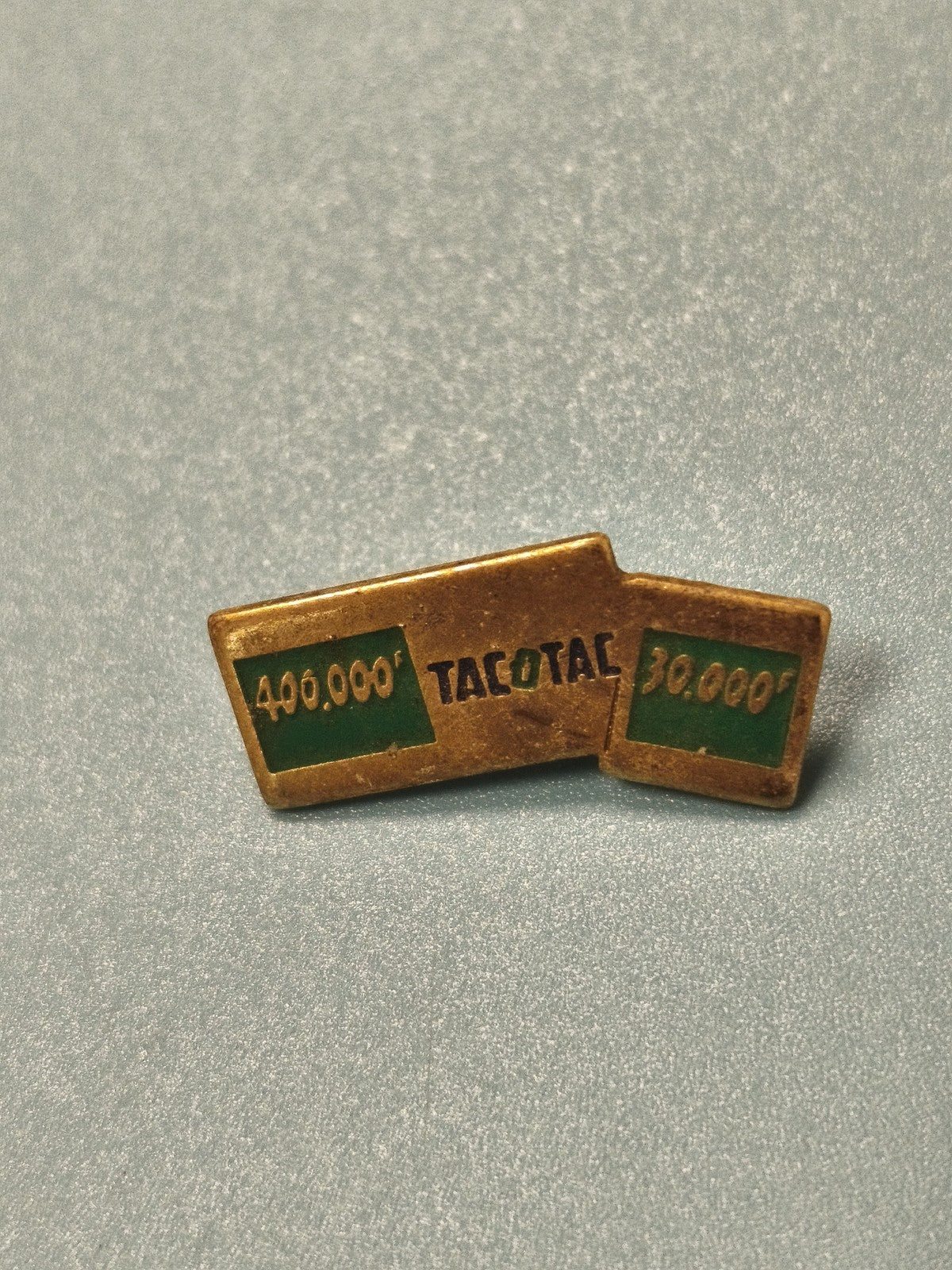 Vintage Tacotac advertising pin, old, rectangular, green and gold colors