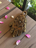 Pendentif main Hamsa vintage métal doré années 50 amulette orientale