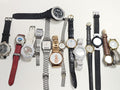 Lot montres femme diverses marques non testées mix occasion à réparer ou pièces