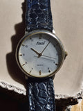 Montre vintage Flami quartz cadran blanc, bracelet effet croco noir