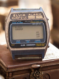 Montre digitale vintage Elvia Quartz LC Alarm chrono années 80, montre-bracelet