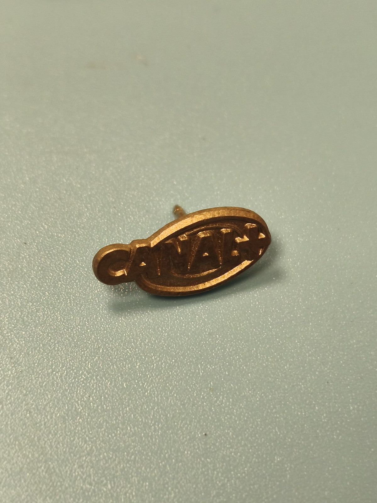 Vintage pin's Canal+ ancien logo bronze collection télévision rare