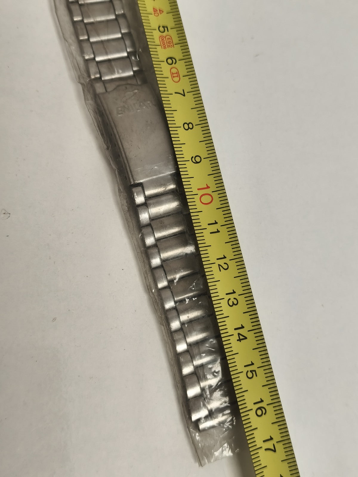 Bracelet montre Enicar vintage, finition métallique, maillons extensibles, ancie