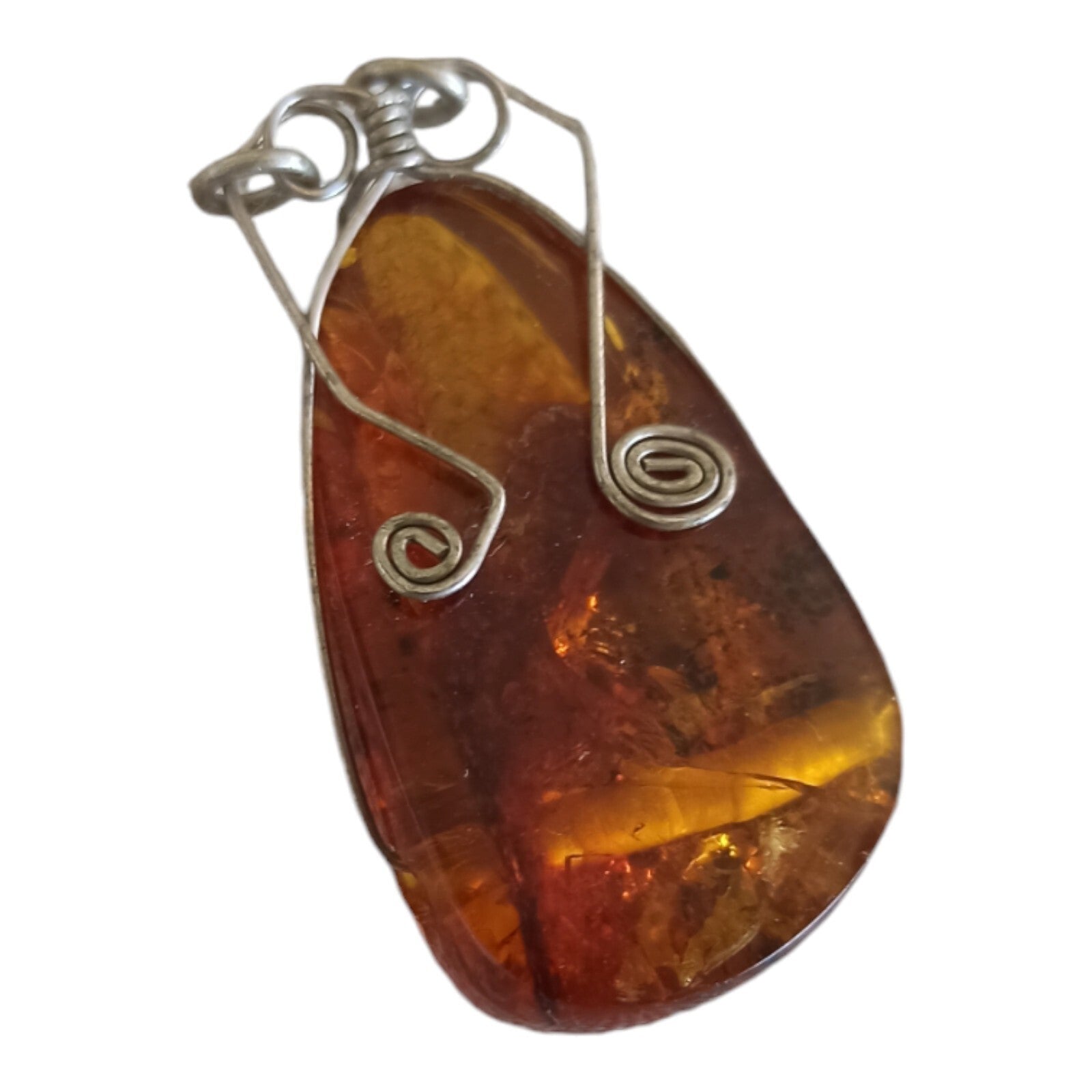 Pendentif ambre authentique monture fil métal style artisanal marron jaune