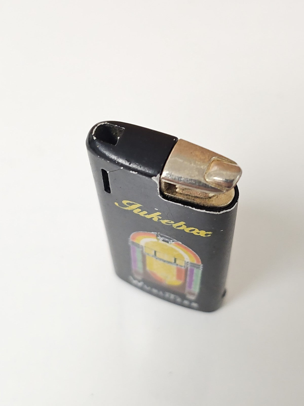 Ancien briquet vintage Jukebox rétro, objet de collection pour amateur d?insolit