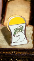 Pin's vintage Zest années 80 – épinglette rétro logo jaune