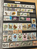 Lot timbres Kenya Ouganda Tanganyika animaux fleurs sports oblitérés (support no