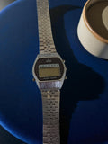 Montre digitale vintage femme, bracelet métal, rétro années 80, Alarm Quartz