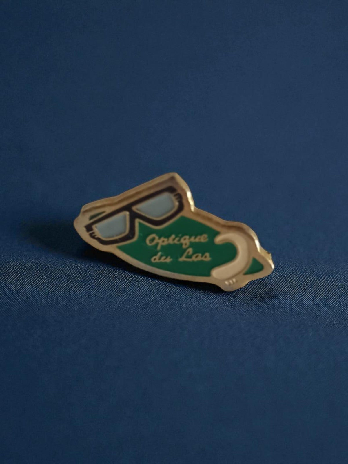 Pin's publicitaire Optique du Las vintage badge rétro années 90 lunettes