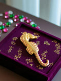 Pin's hippocampe doré vintage édition limitée, broche publicitaire chic
