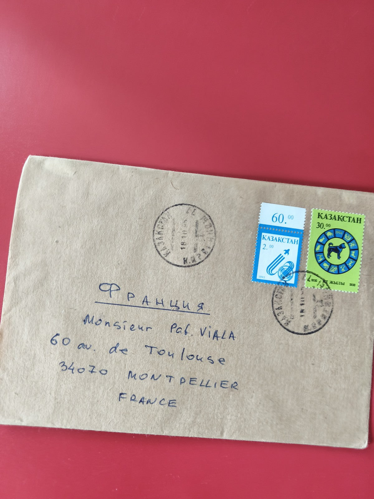 Enveloppe affranchie Kazakhstan pour France avec timbres et cachets postaux
