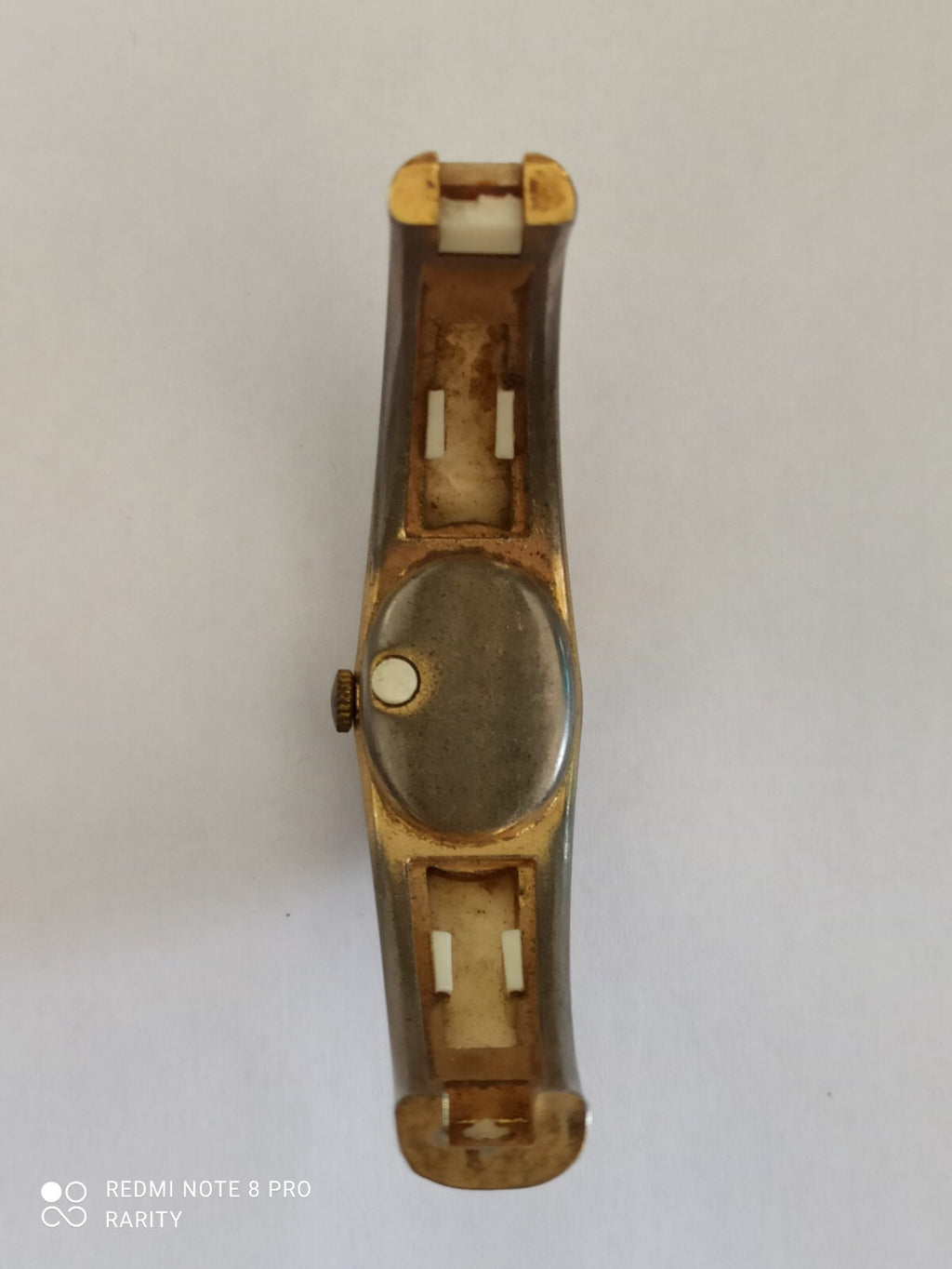Montre vintage femme Mortima ovale cadran doré bracelet blanc rétro