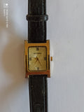 Montre vintage Guy Clarac cadran nacre, rectangulaire, bracelet noir, rétro