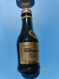 Mignonnette vintage Bisquit Cognac VSOP 3cl, bouteille verte ancienne, mi pleine