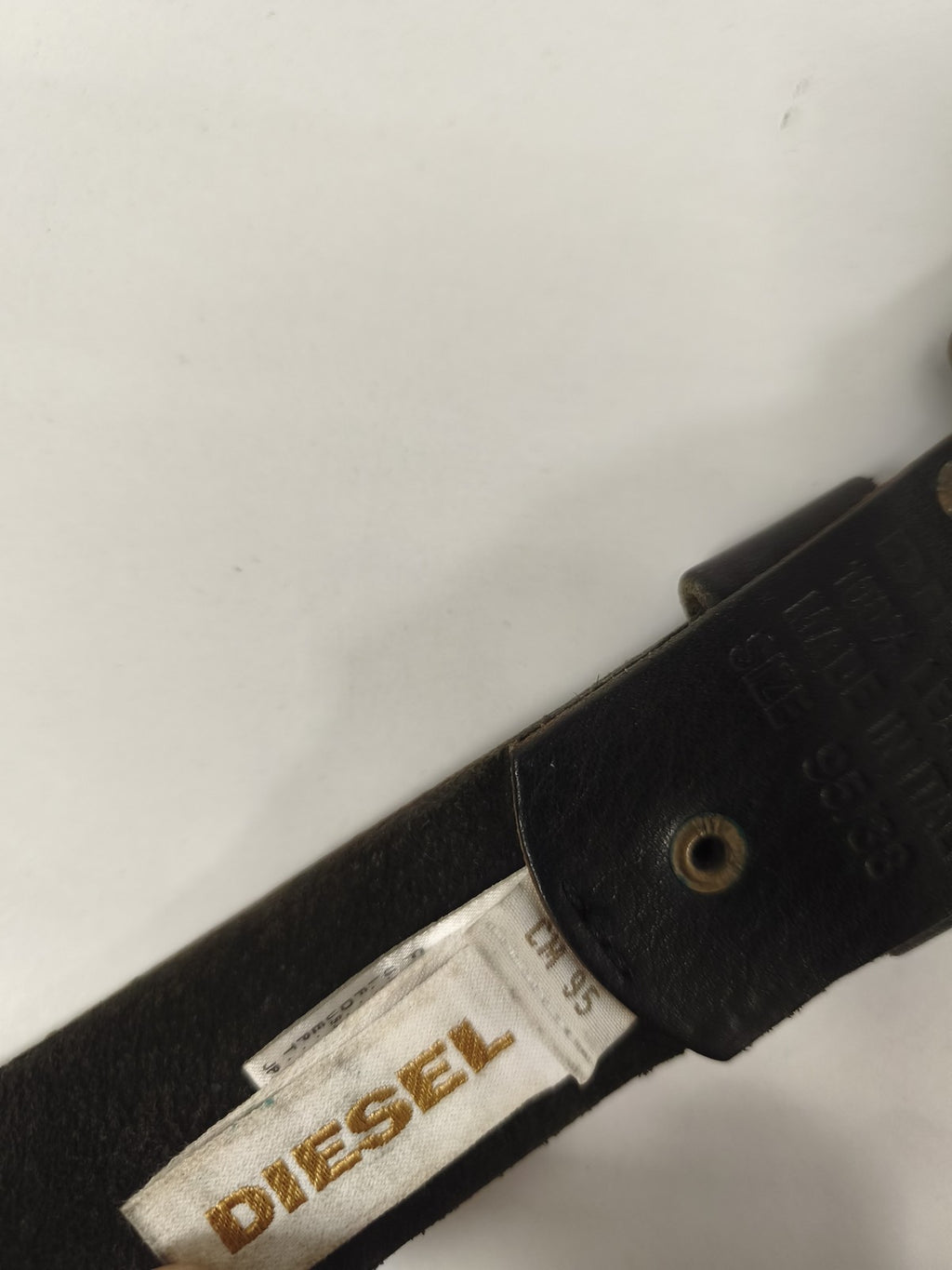 Vintage ceinture Diesel noire à plaques métal doré style industriel