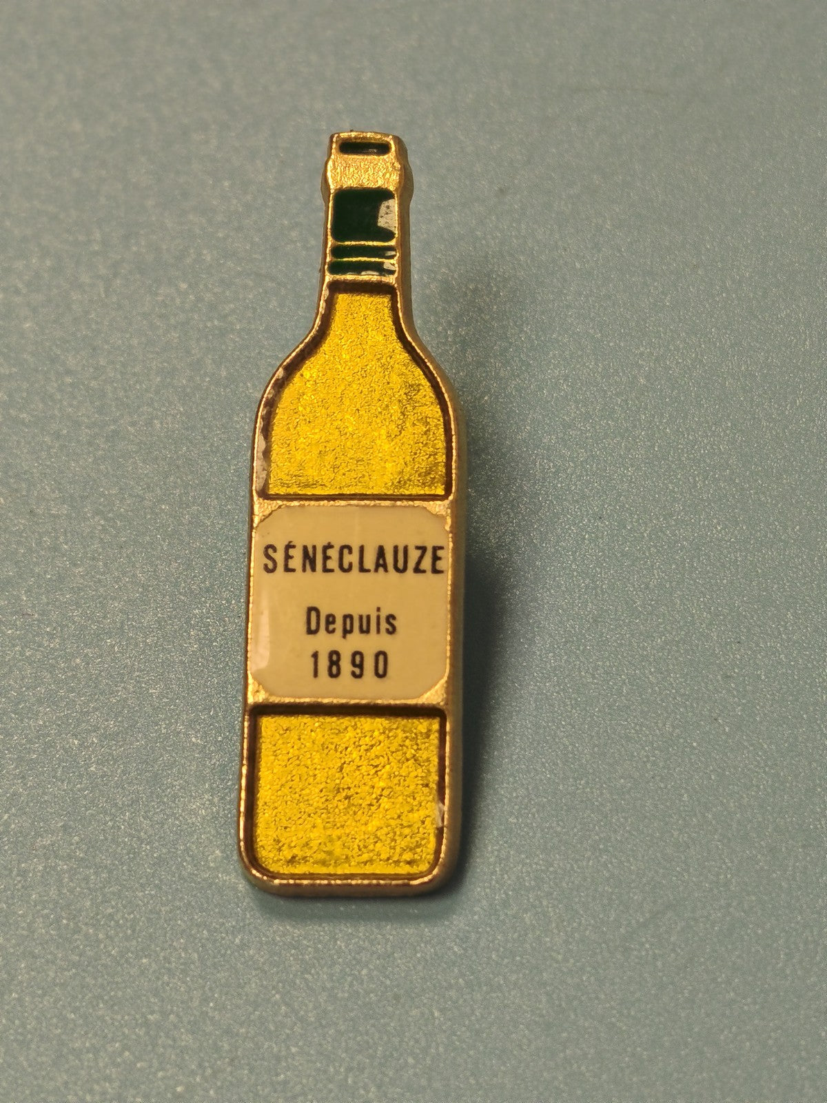 Vintage pin's bouteille Seneclauze émaillé ? objet publicitaire ancien rare
