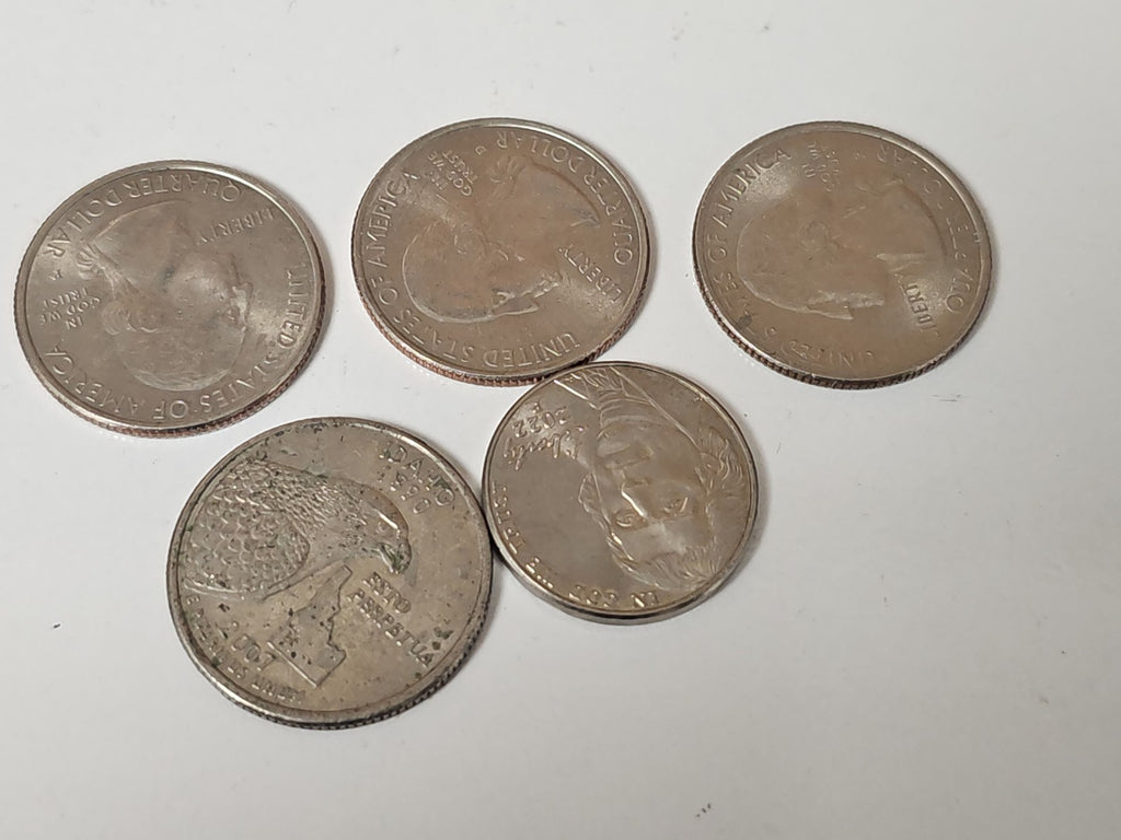 Lot de 5 pièces commémoratives diverses monnaies thématiques, état d'occasion