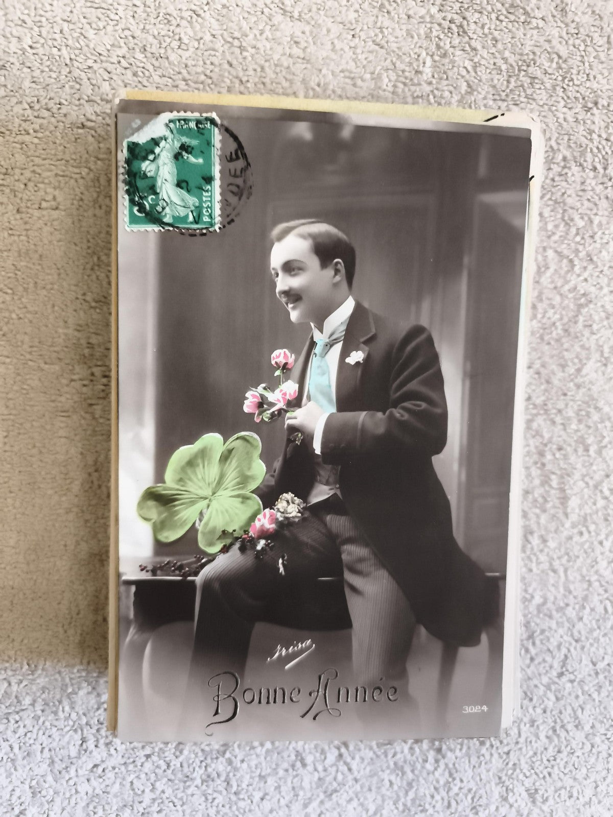 CPA Bonne Année homme trèfle porte-bonheur début XXe photo colorisée